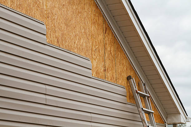 Professional Emergency Siding Repair technician working in Yadkinville, NC